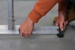 Murdoch Aluminium D Rungs D MAX 3 Section Extension Ladder -Insulation Materials Shop dmax stabiliser bar being deployed